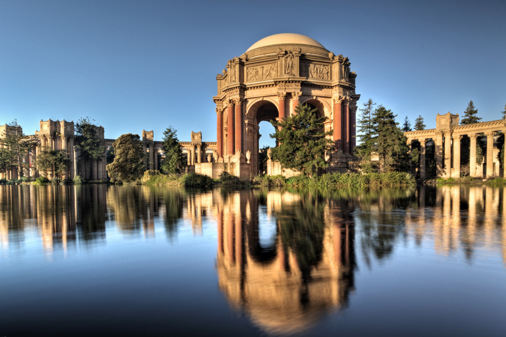 The Palace of Fine Arts in San Francisco, California at sunrise. The Palace of Fine Arts was built in 1915 for the Panama-Pacific Exposition, today we know it as the Worlds Fair. The domed structure was named the Tower of Jewels. The PoFA is currrently undergoing renovation so the onlt access is from the pond. Not sure how long the renovation will take as we left before the Exploratorium open.